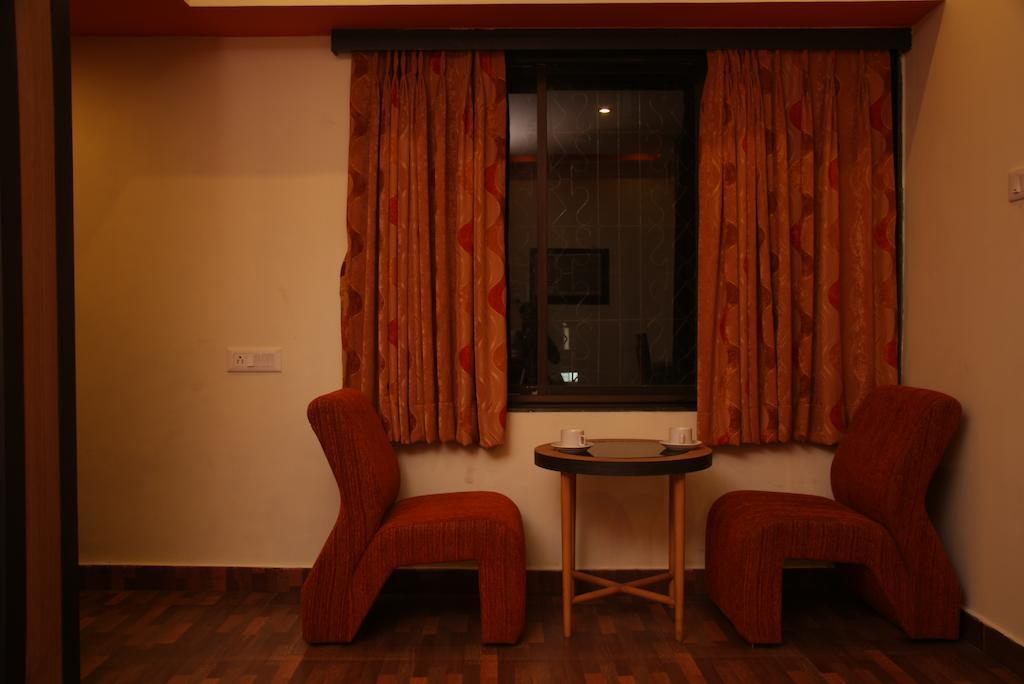 Hotel Trimoorti Kolkata Rom bilde