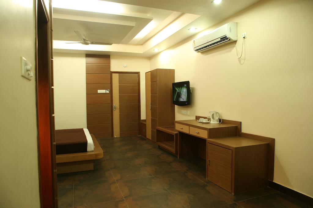 Hotel Trimoorti Kolkata Rom bilde